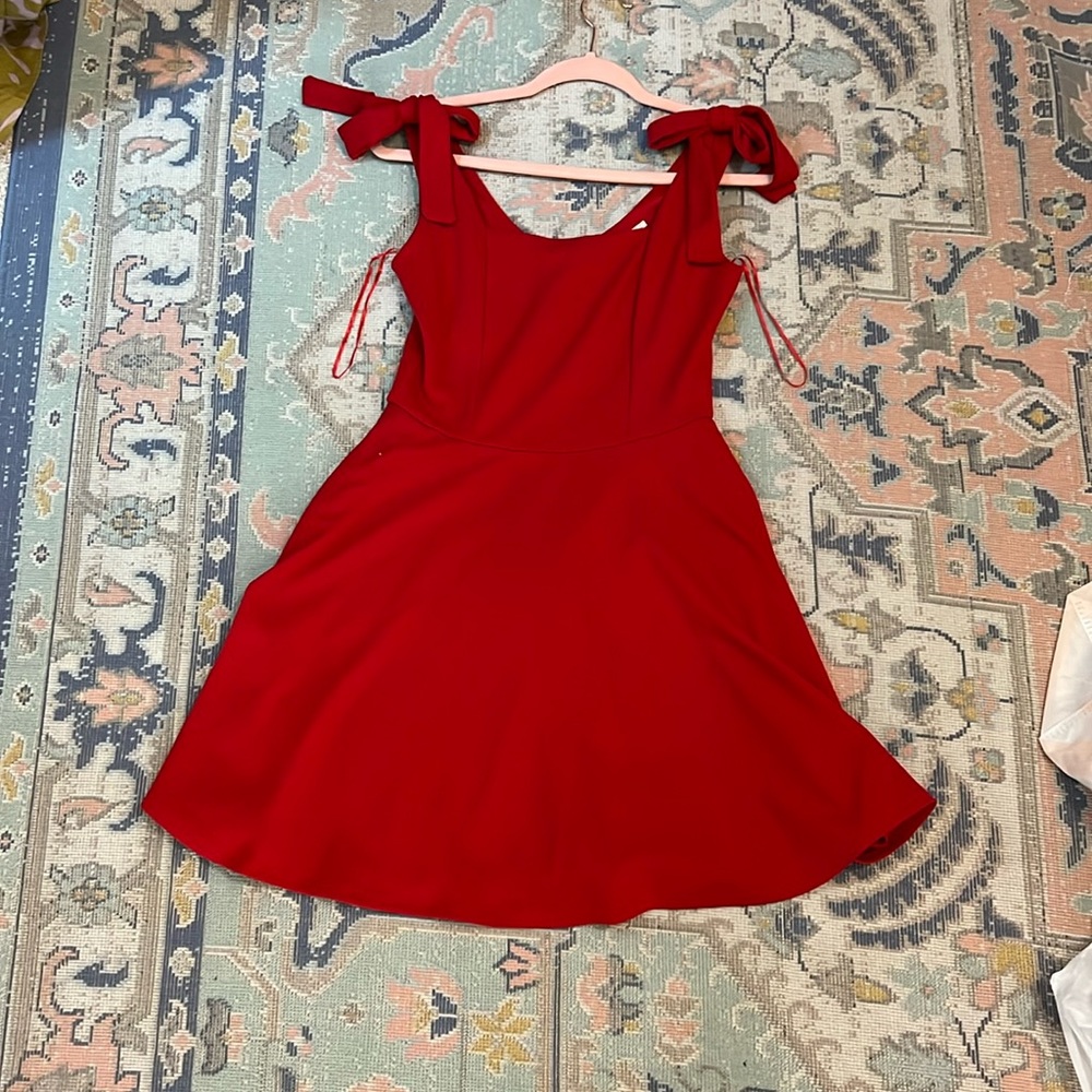 Francesca’s red shoulder bow dress